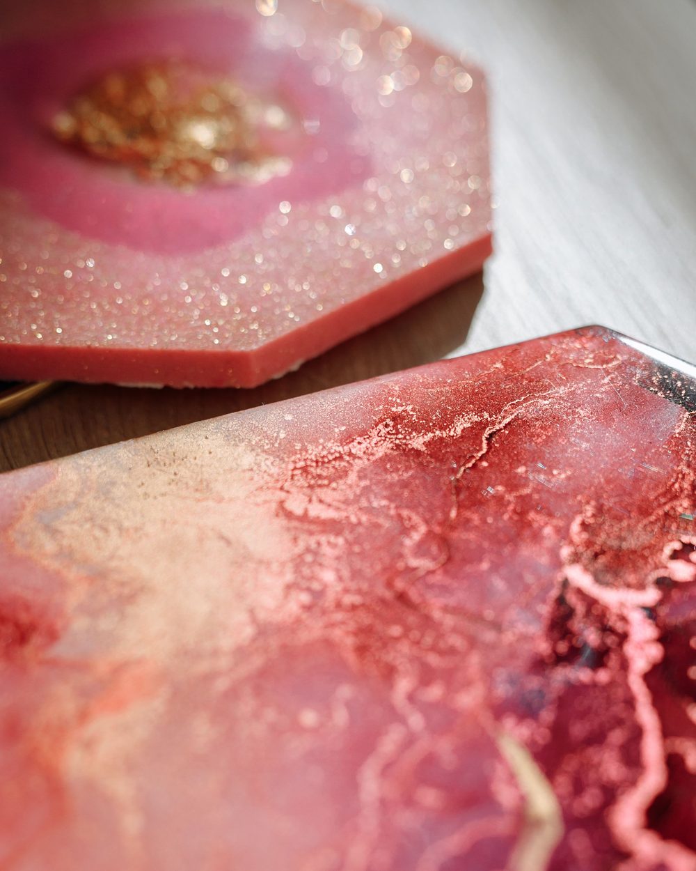 Pink resin pieces with gold veins and glitter